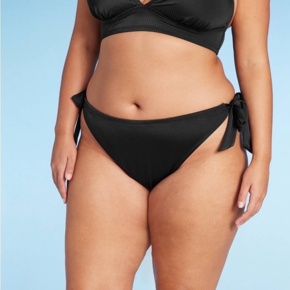 Women's Ribbed Side-Tie Scoop Front High
Leg Cheeky Bikini Bottom - Wild Fable™